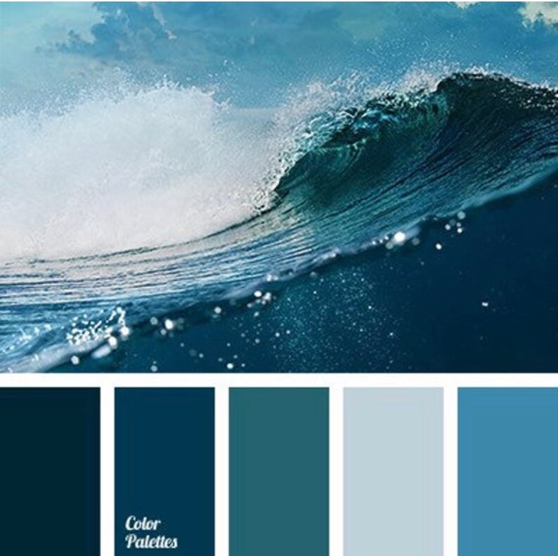 May include: A color palette inspired by the ocean, featuring shades of blue, teal, and gray. The palette includes a deep navy blue, a lighter blue, a teal green, a light gray, and a sky blue.