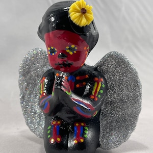 Mini schwarzer Cherub mit silbernen Flügeln