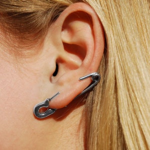 Safety pins in ears shop