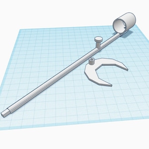 May include: A white, 3D-rendered airbrush tool with a cylindrical body, a long, straight barrel, and a small, curved wrench-like component. The airbrush features a nozzle and a small, raised button. The objects are set against a blue grid background.