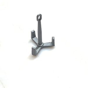 May include: A small, gray, 3D printed anchor with a loop at the top. The anchor has three arms that are curved at the ends.