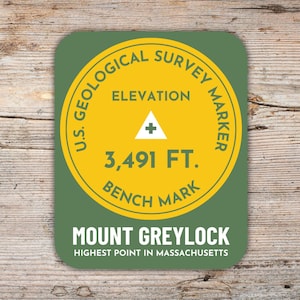 May include: A rectangular sticker with rounded corners featuring a yellow circle on a green background. The text reads U.S. GEOLOGICAL SURVEY MARKER, ELEVATION 3,491 FT. BENCH MARK, MOUNT GREYLOCK, and HIGHEST POINT IN MASSACHUSETTS with a triangle icon.