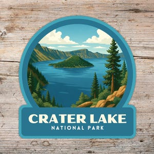 May include: A teal and blue sticker featuring a scenic illustration of Crater Lake National Park. The image shows a lake with an island, surrounded by mountains and trees. The text "CRATER LAKE NATIONAL PARK" is displayed at the bottom.