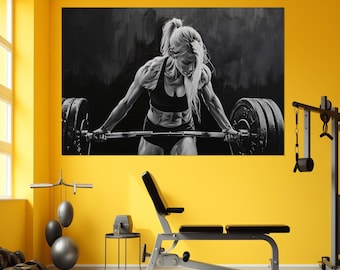 May include: A black and white photograph of a person lifting weights in a gym. The person is wearing a sports bra and shorts. The weights are on a barbell.