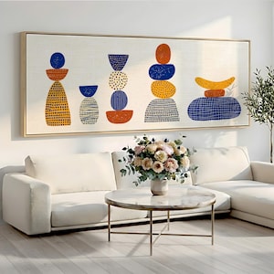 May include: A rectangular wall art canvas featuring a series of stacked abstract shapes in blue, orange, and yellow. The artwork displays various geometric forms including circles, semicircles, and ovals, each decorated with distinct patterns like dots, lines, and dashes on a textured off-white background.