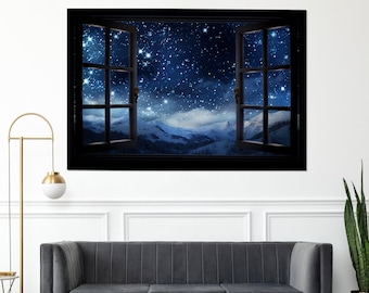 May include: A black framed canvas print of a window looking out at a starry night sky with snow-capped mountains in the distance.