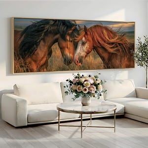 May include: A rectangular wall art print featuring two horses with flowing manes standing in a grassy field at sunset. One horse is dark brown with a black mane, and the other is a lighter reddish-brown with a white-spotted face and mane.