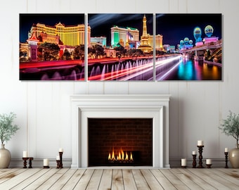 May include: A triptych canvas print depicting a nighttime cityscape of Las Vegas. The artwork showcases illuminated hotels, the Eiffel Tower replica, and vibrant light trails from moving vehicles, with a water fountain in the foreground.