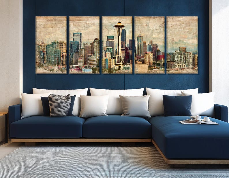 May include: A five-panel wall art set depicting a cityscape with a prominent tower. The artwork features a vintage, textured style with muted colors of beige, blue, and brown. A navy blue sectional sofa with white pillows is in the foreground.