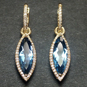 14k solid yellow gold earrings with 0.45 ct. SI1 clarity, G color natural brilliant diamonds & 6.90 ct. 18x6mm natural AAA London blue topaz
