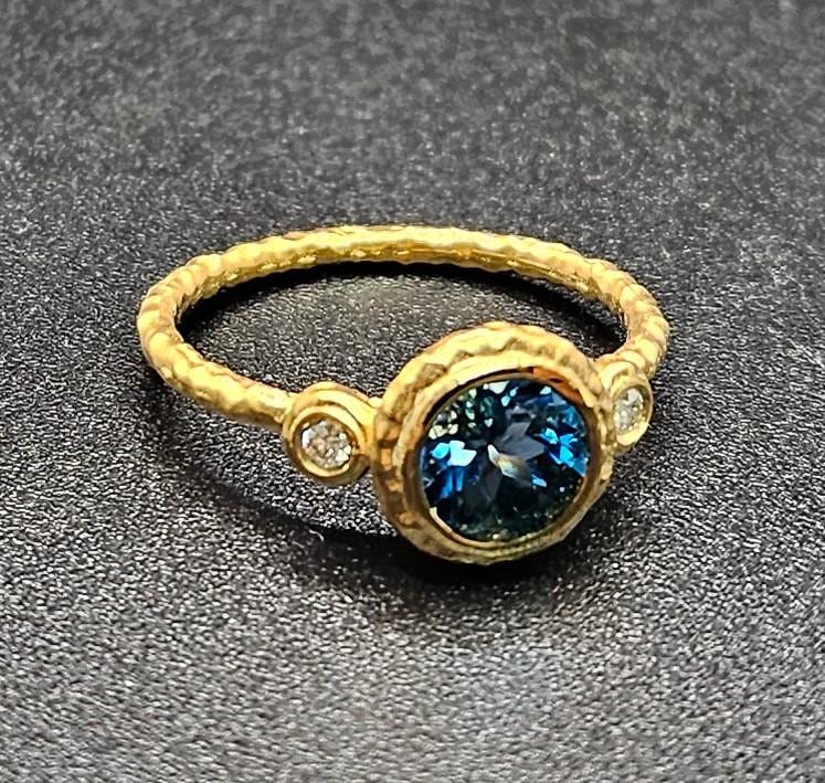 14k solid yellow gold hammered ring with 0.05 ct. SI1 clarity, G color natural brilliant diamonds & 1.00 ct. natural AAA London blue topaz.
