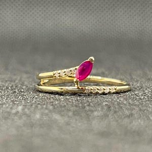 14k solid yellow gold ring with 0.05 ct. SI1 clarity, G color natural brilliant diamonds & 0.18 ct. natural AAA Ruby
