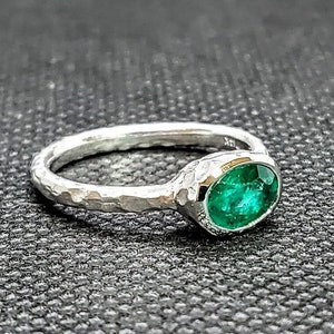 14k solid white gold hammered ring with 0.75 ct. 7x5 mm oval shape natural AAAA  Colombian emerald.