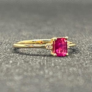14k solid yellow gold ring with 0.02 ct. SI1 clarity, G color natural brilliant diamonds & 0.65 ct. 5x4 mm natural AAA Ruby