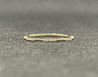 14k solid yellow gold eternity band with 0.11 ct. SI1 clarity, G color natural brilliant diamonds