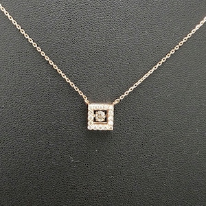 14k solid rose gold dancing diamond necklace with 0.30 ct. natural champagne diamonds.