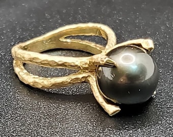14k solid yellow gold hammered split shank ring with a 10 mm natural black Tahitian pearl.