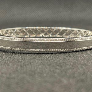 14k solid white gold and diamond bangle bracelet with 0.42 ct. SI1 clarity, G color natural brilliant diamonds