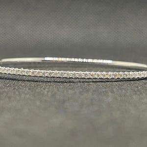 14k solid white gold and diamond bangle bracelet with 0.78 ct. SI1 clarity, G color natural brilliant diamonds