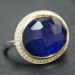14k solid two tone gold ring with 0.55 ct. SI1 clarity, G color natural brilliant diamonds & 17.50 ct. 20x15 mm oval shape natural lapis.