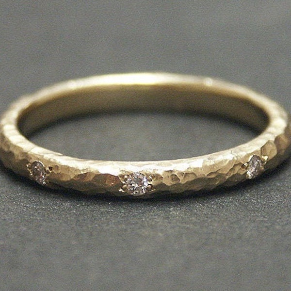 14k solid yellow gold hammered eternity band with 0.13 ct. SI1 clarity, G color natural brilliant diamonds.