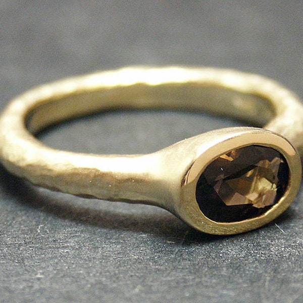 14k solid yellow gold hammered ring with 0.65 ct. 7x5 mm oval shape natural AAA smoky quartz.