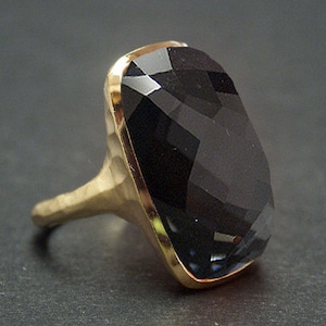 14k solid yellow gold hammered ring with 29.50 ct. 25x13 mm long cushion shape natural hematite.