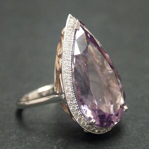 14k solid two-tone gold ring with 0.60 ct. SI1 clarity, G color natural brilliant diamonds & 18.60 ct. natural AAA rose de France amethyst.
