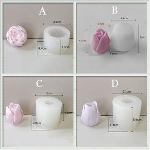 May include: Four silicone molds for making flower-shaped candles. The molds are white and have different sizes. The molds are shown with pink and purple flower-shaped candles.