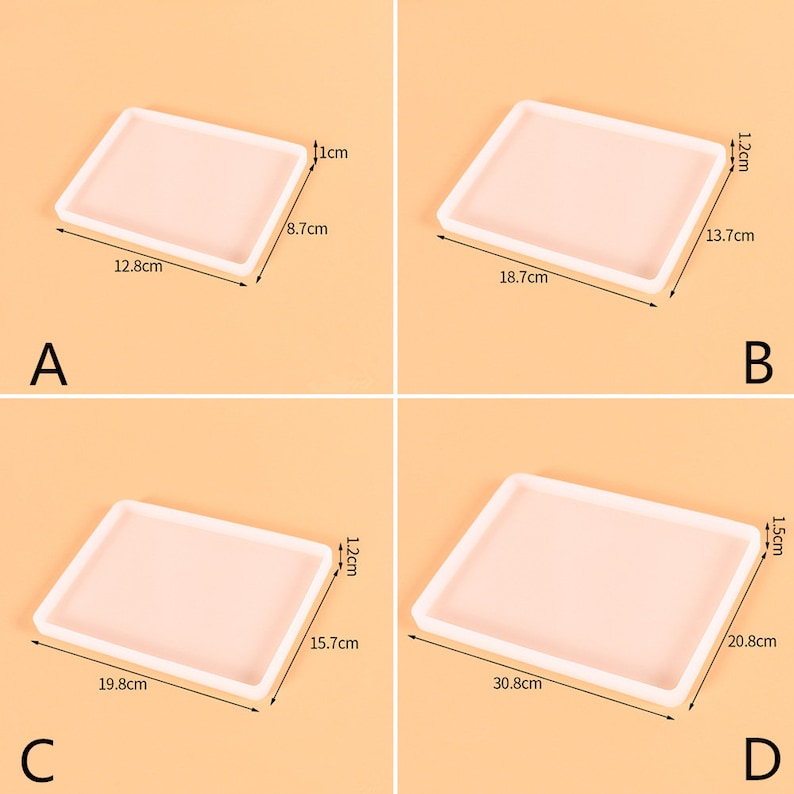 May include: Four white rectangular silicone molds of different sizes. The molds are 1 cm, 1.2 cm, 1.2 cm, and 1.5 cm thick. The molds are 8.7 cm x 12.8 cm, 13.7 cm x 18.7 cm, 15.7 cm x 19.8 cm, and 20.8 cm x 30.8 cm.