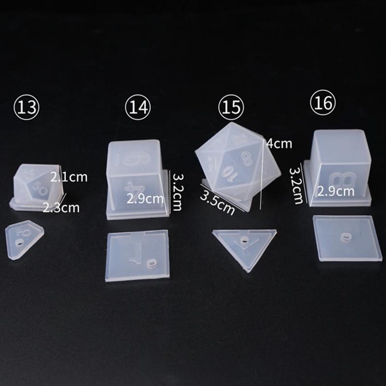 May include: Set of six clear silicone molds for making dice. The molds are numbered 13 through 16 and include a d4, d6, d8, d10, d12, and d20. The molds are 3.2 cm tall and 2.9 cm wide.