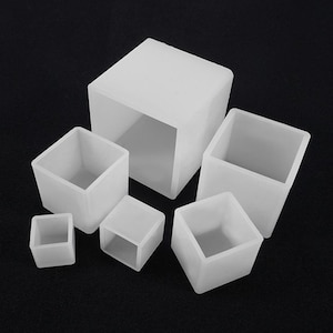 May include: Set of six white silicone square molds of varying sizes. The molds are made of flexible silicone and are perfect for making resin crafts.