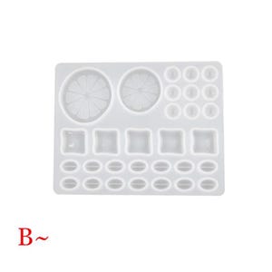 May include: White silicone mold with various shapes, including circles, squares, and ovals. The mold is designed for creating resin crafts.