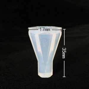 May include: A clear silicone mold shaped like a diamond, measuring 1.7 inches wide and 3.5 inches tall.