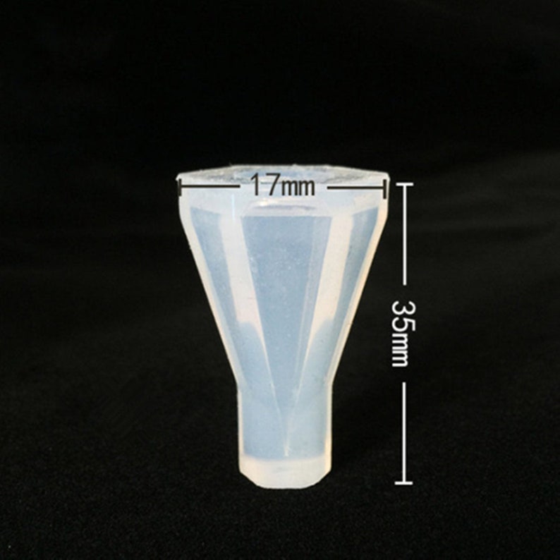 May include: A clear silicone mold shaped like a diamond, measuring 1.7 inches wide and 3.5 inches tall.