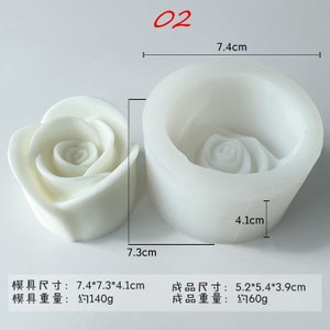 May include: White silicone mold for making rose-shaped candles. The mold is 7.4 inches in diameter and 4.1 inches tall. The finished candle is 5.2 inches in diameter and 3.9 inches tall.
