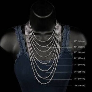 May include: A silver chain necklace on a mannequin, showing different lengths from 16 inches to 30 inches. The lengths are labeled in inches and centimeters.