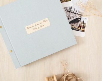 Handcrafted photo album with golden screws