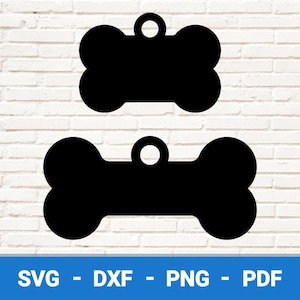 May include: Two black bone-shaped dog tag pendants with a hole at the top for attaching a chain or ribbon. The pendants are blank and ready to be personalized.