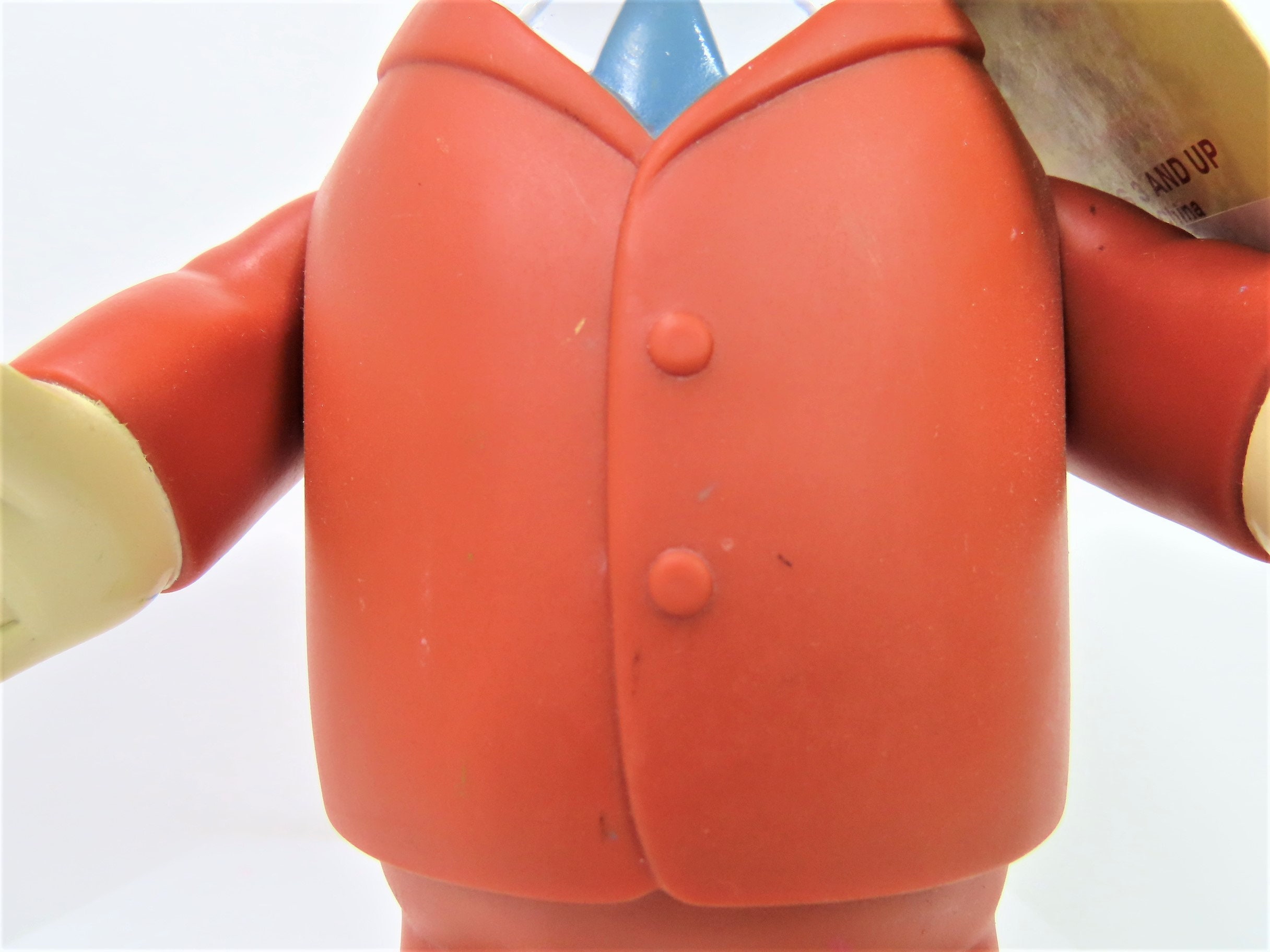 A Vintage 1994 Looney Tunes Mugsy Vinyl Collector Doll