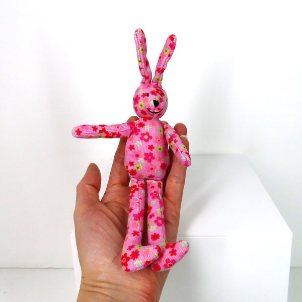 A vintage early 2000 Jellycat floral corduroy bunny.