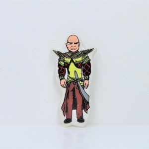 A vintage 1992 thunderbirds The Hood plastic badge.