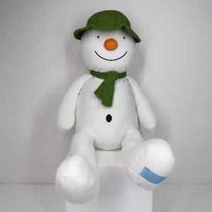 A large 18 inch Raymond Briggs The Snowman soft toy plush.