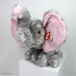 A vintage 2002 TY Beanie Babies Classic Teensy the elephant with swing tag.