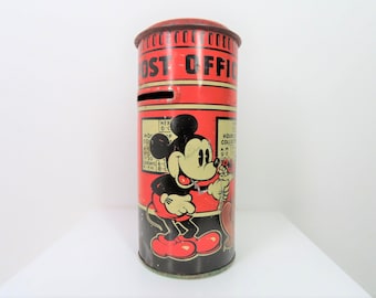 A vintage 1930s Mickey Mouse post office tin moneybox, features Pluto and Minnie.  By Happynak, made in England.