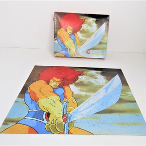 A vintage 1986 Thundercats Lion-O puzzle complete with box.