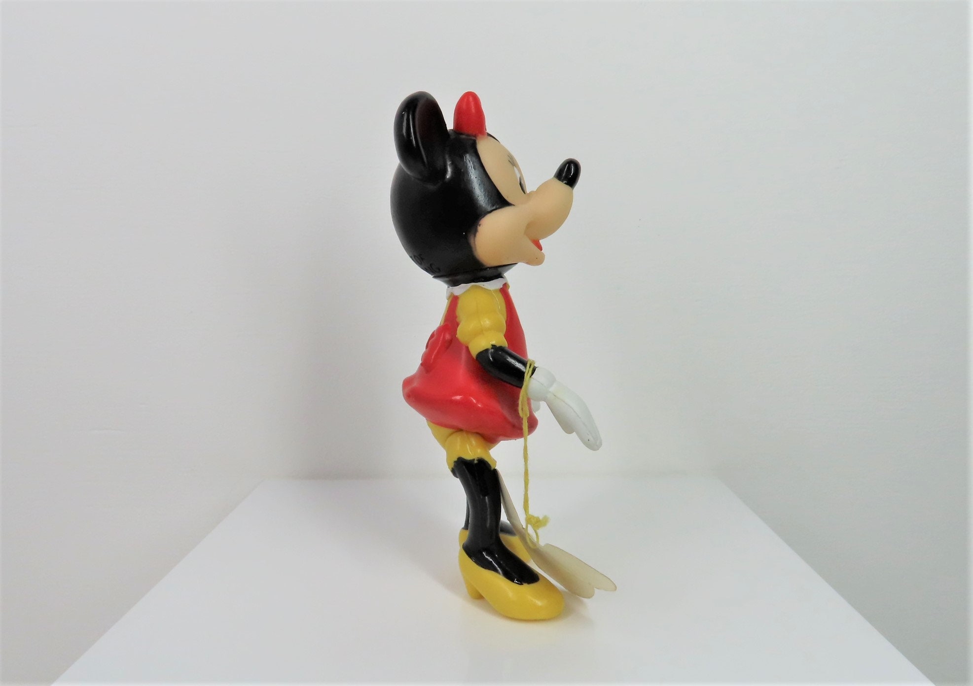 A Vintage 1960s - 1970s Minnie Mouse Figure With Swing Tag and in