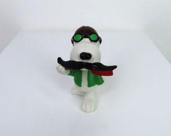Una figura de juguete piloto de Snoopy vintage de los años 90.