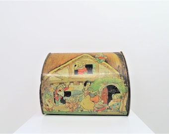 A vintage 1960s Snow White and the seven dwarves tin.