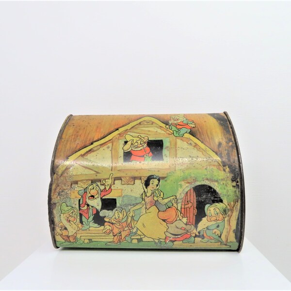 A vintage 1960s Snow White and the seven dwarves tin.